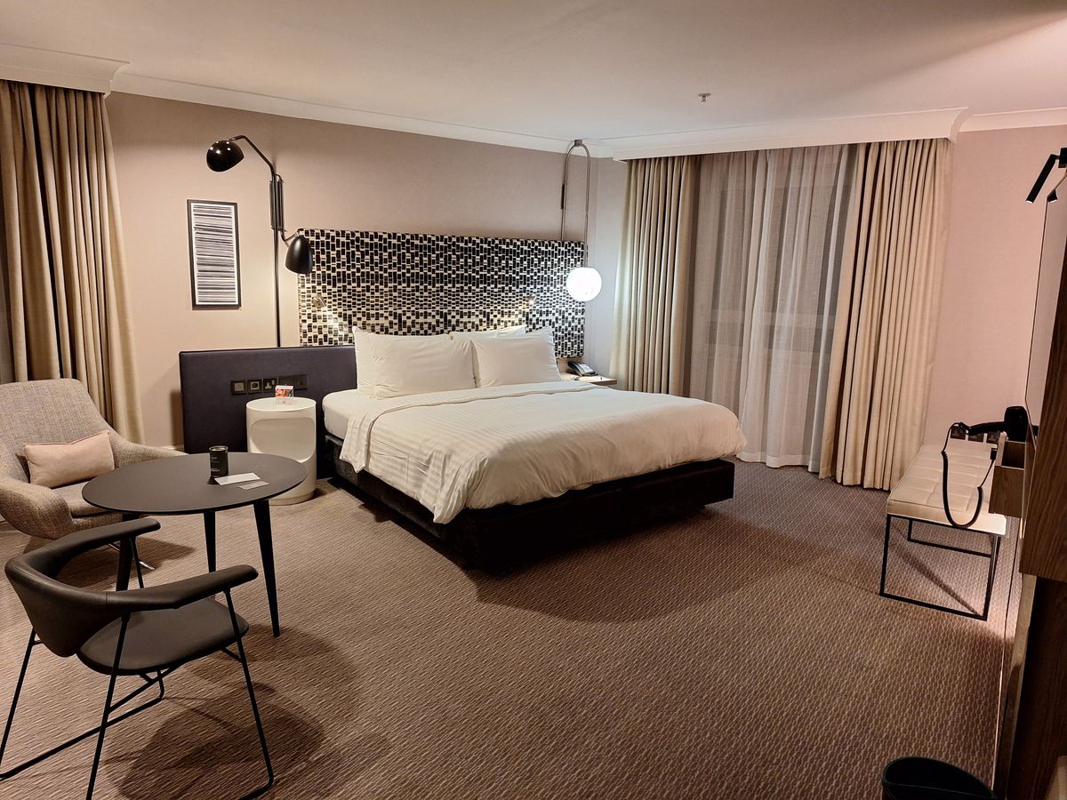 Modern hotel room in London of the kind an online travel agency sells through hotel bedbank suppliers