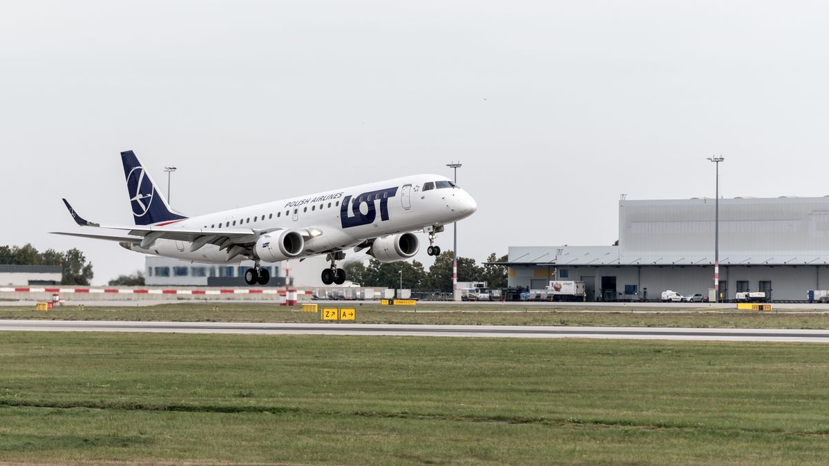 Passenger jet taking off from an airport runway, representing flight fares that agencies mark up with fixed fees per passenger