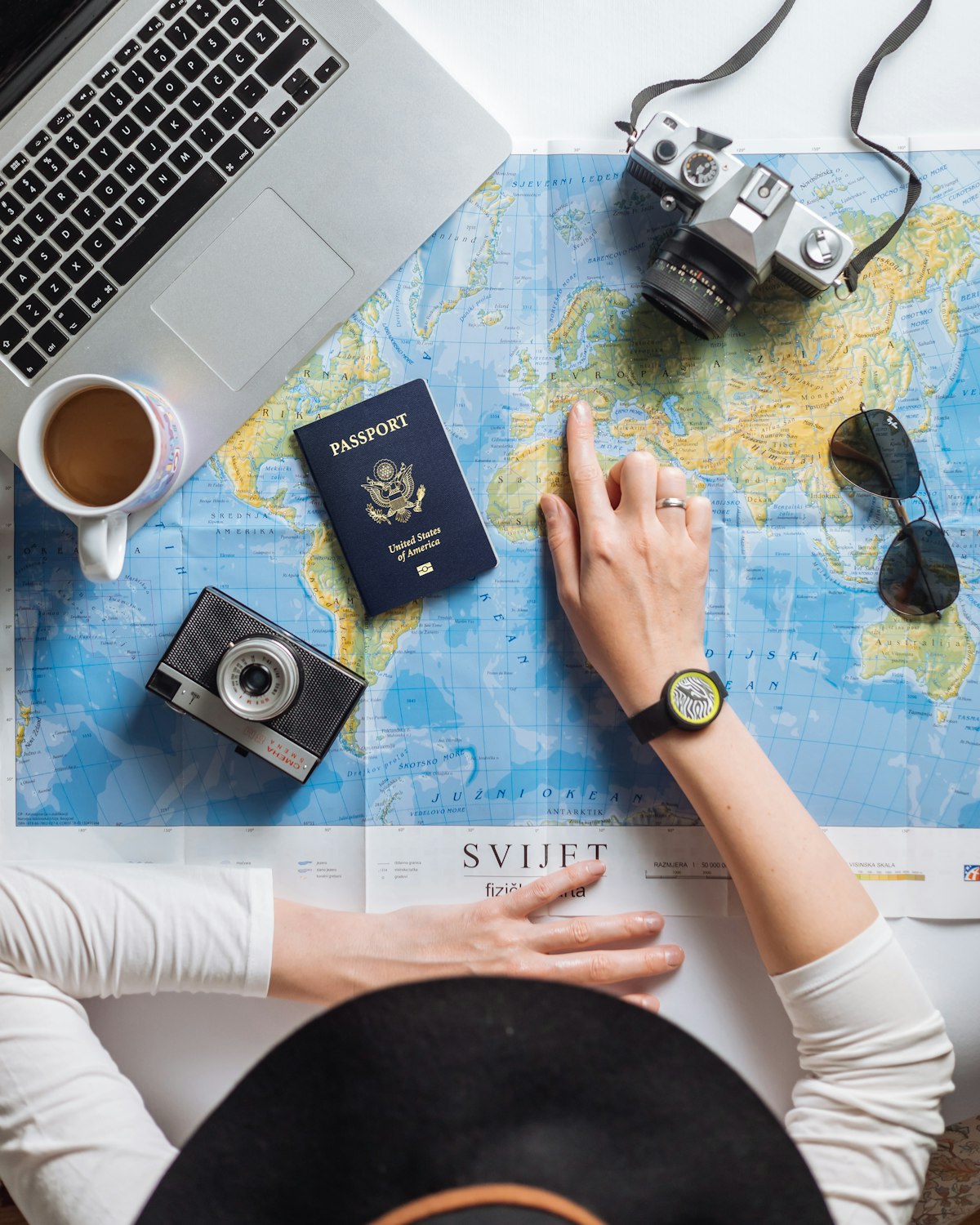 Planning a trip with a map and passport