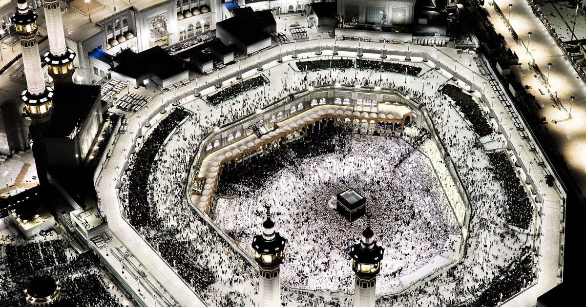 Aerial night view of pilgrims around the Kaaba at Masjid al-Haram in Makkah, the destination every Umrah booking website sells